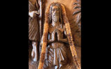 A lei adorns a carving of Christ in a Catholic mission in Nuka Hiva.