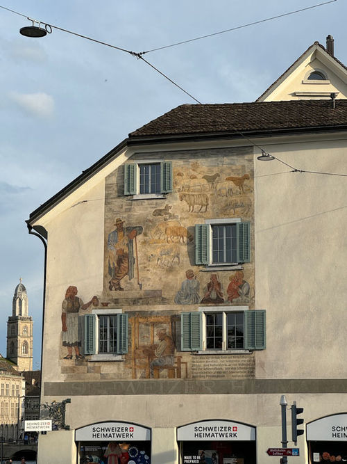 A mural in Zurich's Old Town tells us this house was once the site of a business that processed wool using water from the Limmat River.