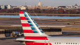 American Airlines says it is gradually winning back corporate business