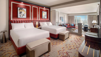 Red and gold jewel tones help define the redesigned suites at the Venetian, which were inspired by the ornate costumes of the Carnival of Venice.