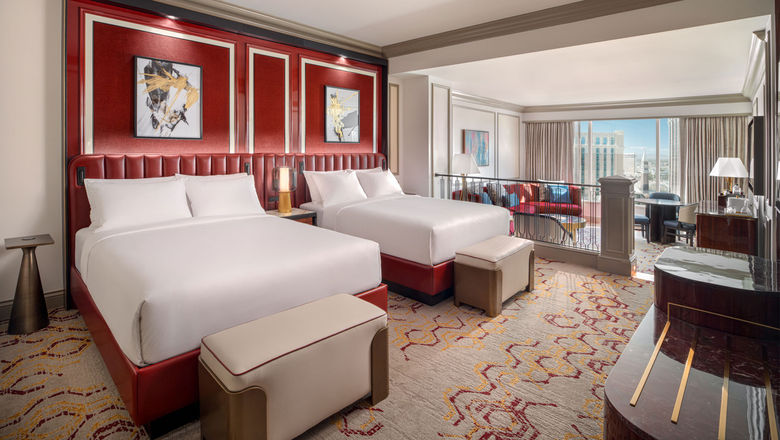 Red and gold jewel tones help define the redesigned suites at the Venetian, which were inspired by the ornate costumes of the Carnival of Venice.