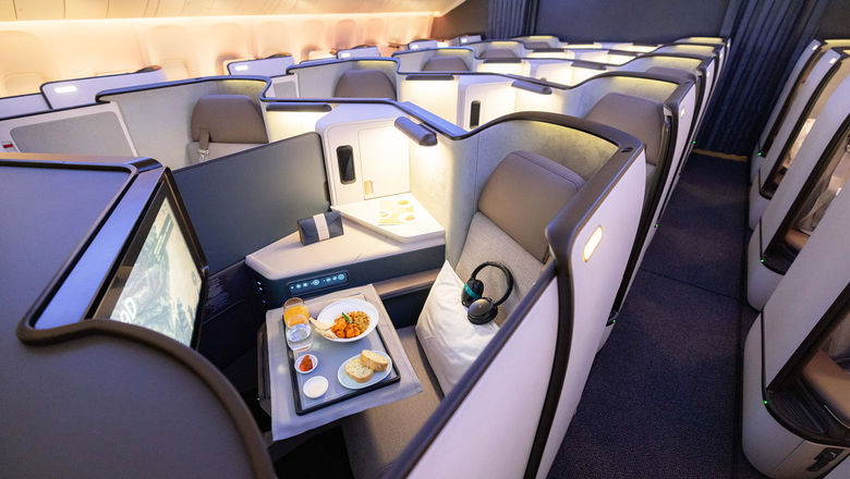 The new Aria business-class seat offers the airline's first business-class privacy door as well as a removable divider between the center seats.