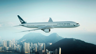 A Cathay Pacific Boeing 777-300ER plane over Hong Kong.