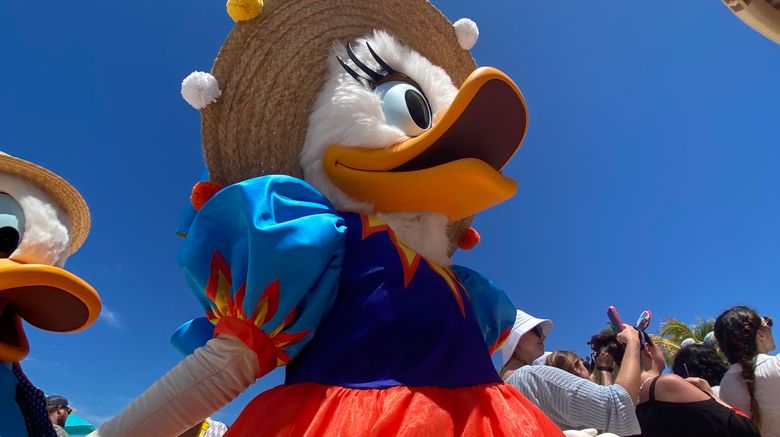 Disney Cruise Line on June 7 welcomed the first guests to Lookout Cay at Lighthouse Point, a private destination located on the Bahamian island of Eleuthera.  Pictured, Daisy Duck in her Junkanoo costume.