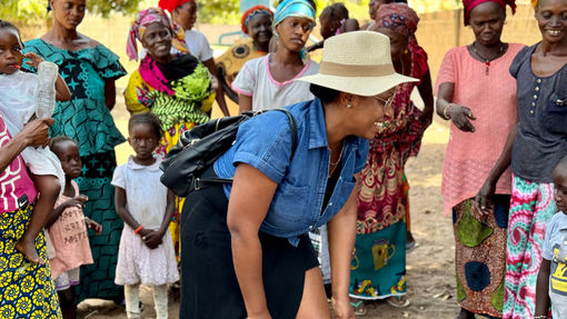 Travel Weekly's Nicole Edenedo joins the women of Dumbutu village near Kiang West National Park in The Gambia for a drum and dance circle.