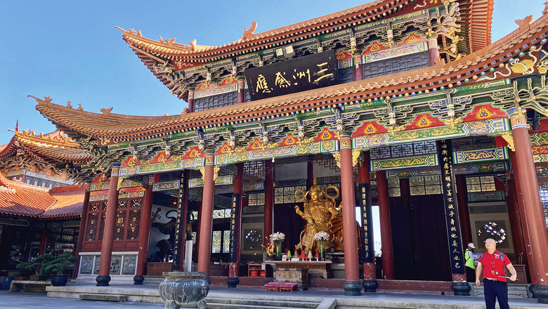 Cruise editor Andrea Zelinski tried to ward off jet lag on her trip to China. Here, A Viking tour guide stands at the Zhong Putuo Temple during the line's inaugural China cruise with English-speaking guests.