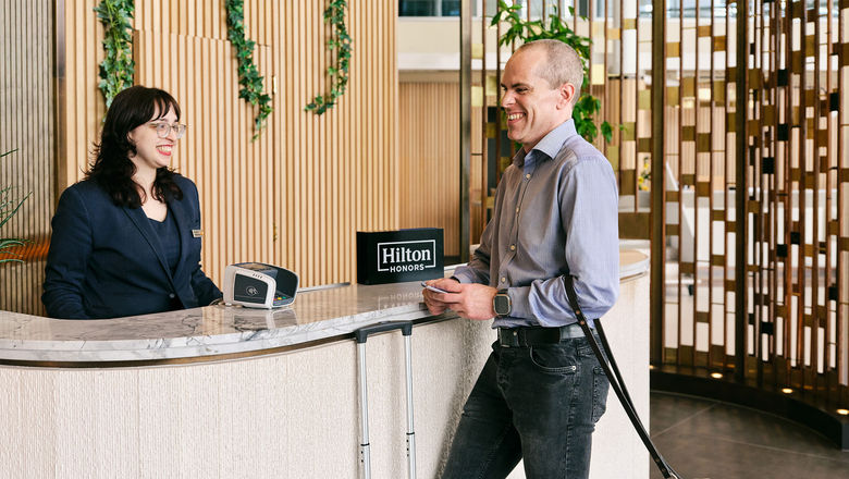 A Be My Eyes user checking in at a Hilton property.