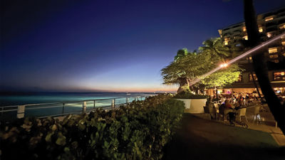 Night falls at House Without a Key at the Halekulani resort in Honolulu.