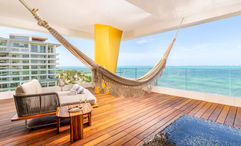 Corner suites at the Hotel Mousai Cancun feature wraparound terraces, hammocks and private plunge pools.