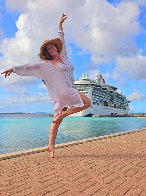 Social media influencer Jenny Hunnicutt poses in Bonaire during Royal Caribbean's Ultimate World Cruise.