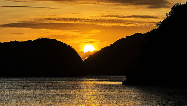 Sunrise in the Rock Islands. The Explorer has a special permit to remain within the Rock Islands Southern Lagoon, a Unesco World Heritage Site.