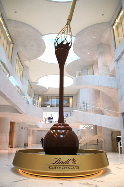 The 30.5-foot fountain spouting chocolate in the atrium at the Lindt Home of Chocolate in Kilchberg.