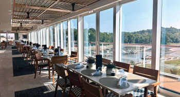 The indoor/outdoor Aquavit Terrace on Deck 5 aboard the Viking Mississippi.