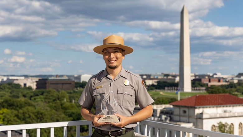 Michael Newman of Hawaii Volcanoes National Park with his “Excellence in Interpretation” award in Washington.